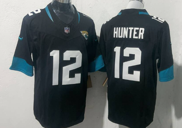 Men's Jacksonville Jaguars #12 Travis Hunter  Limited Football Stitched Jersey